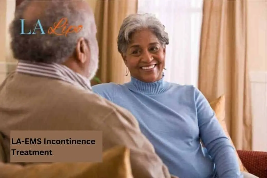 Couple sat smiling at each other - LA-EMS treatment West Bromwich